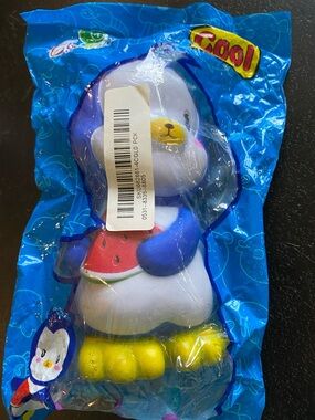 Chameleon “cool” penguin with watermelon squishy toy